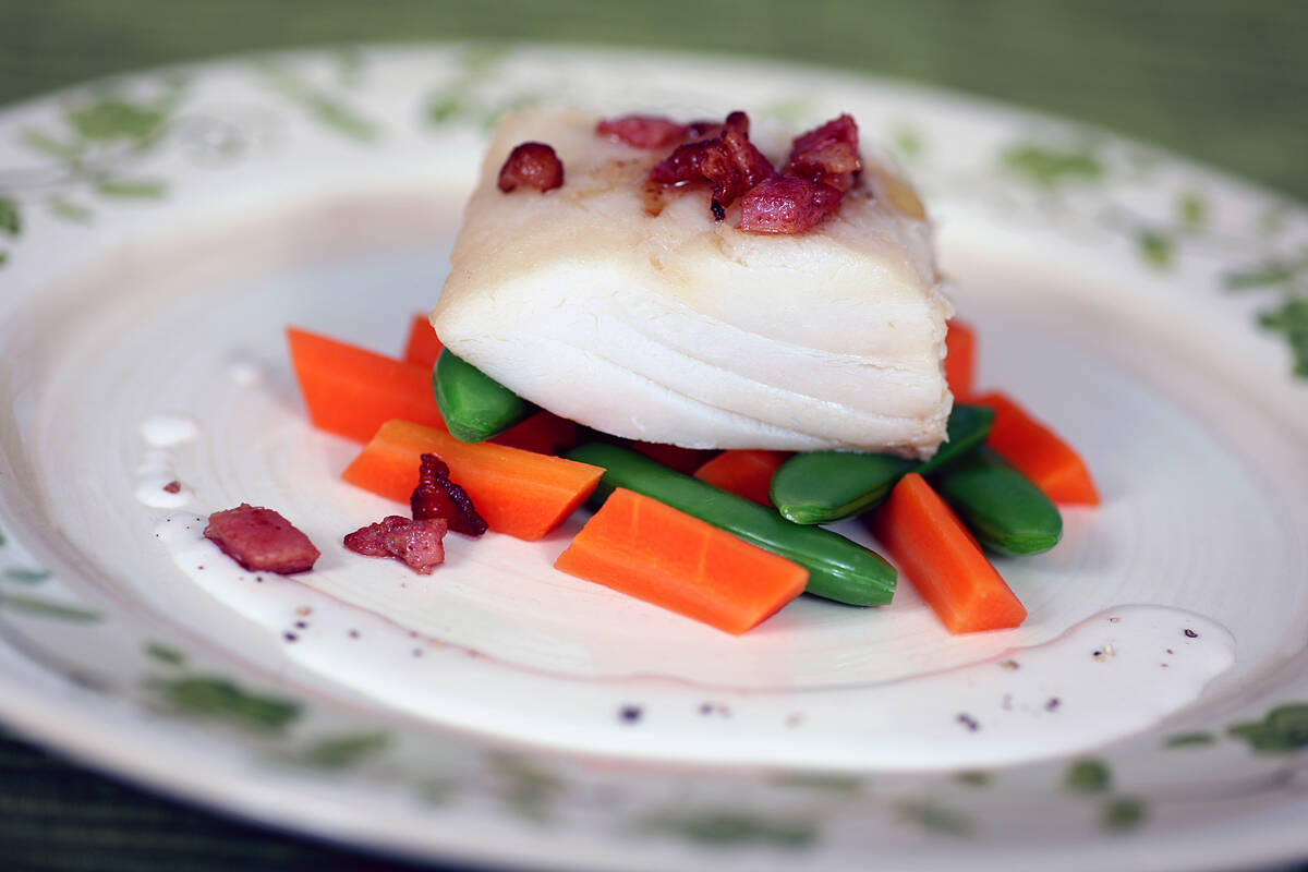 Klippfisk tilberedt med bacon og grønnsaker. Illustrasjonsfoto: Bent Raanes / Norwegian Seafood Council